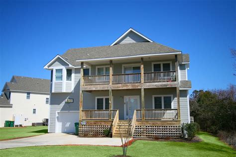 Beautiful and comfortable home, plenty of room for family and friends to make those unforgettable vacation memories of the OBX. . Village reality obx